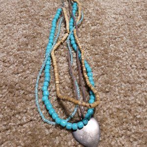 Vintage Express brand turquoise and brown beads with silver heart